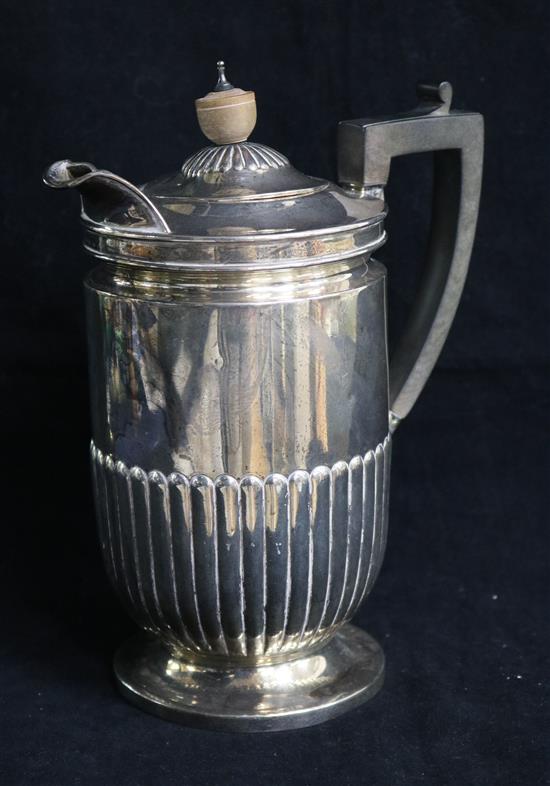 A late Victorian demi fluted silver hot water pot by Henry Stratford, Sheffield, 1894, gross 20.5 oz.